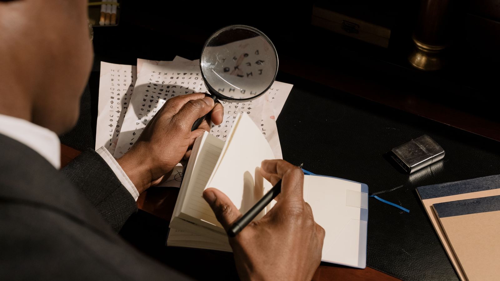 Investigator reviewing coded background check documents with a magnifying glass and taking notes