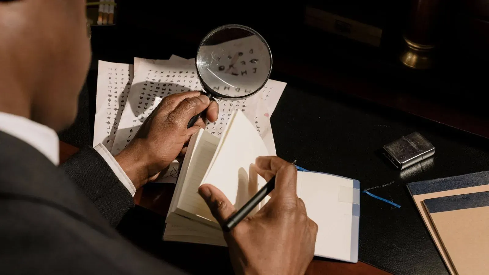 Investigator reviewing background check documents with a magnifying glass and taking notes