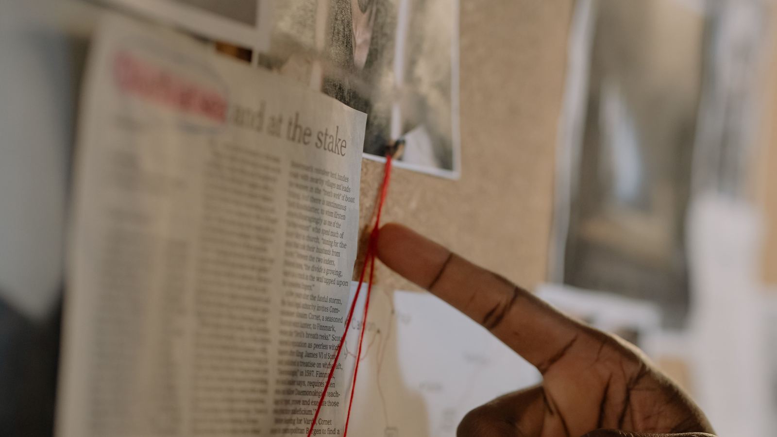 Investigation evidence board with a map and connected leads, representing skip tracing and asset tracing work used to locate a missing person or debtor